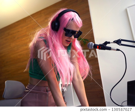 Beautiful young singer and musician broadcast from her home studio 130587027