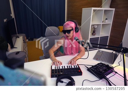 Beautiful young singer and musician broadcast from her home studio 130587205