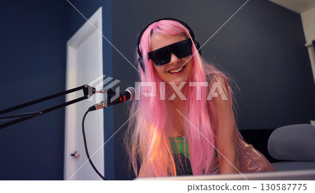 Beautiful young singer and musician broadcast from her home studio Beautiful young singer and musician broadcast from her home studio 130587775