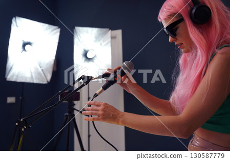 Beautiful young singer and musician broadcast from her home studio 130587779