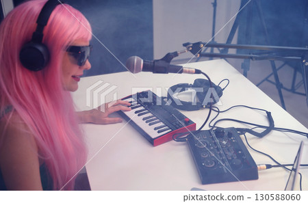 Beautiful young singer and musician broadcast from her home studio 130588060