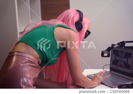 Beautiful young singer and musician broadcast from her home studio 130588066