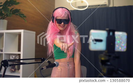 Beautiful young singer and musician broadcast from her home studio 130588070