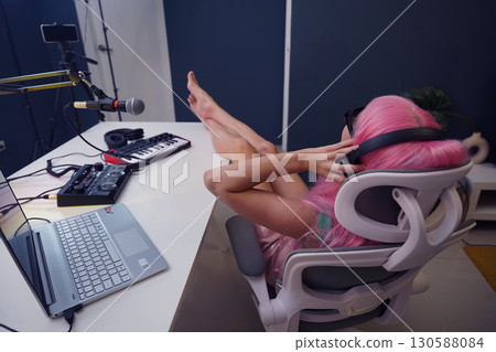 Beautiful young singer and musician broadcast from her home studio 130588084