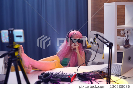 Beautiful young singer and musician broadcast from her home studio 130588086