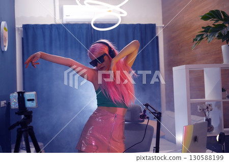 Beautiful young singer and musician broadcast from her home studio Beautiful young singer and musician broadcast from her home studio 130588199