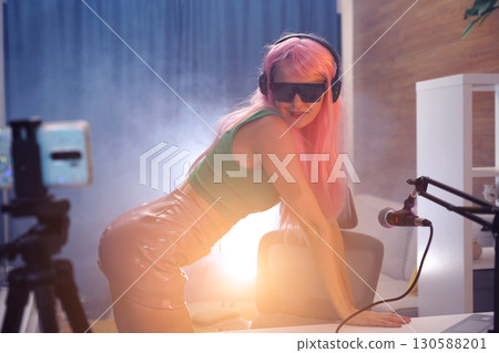 Beautiful young singer and musician broadcast from her home studio 130588201