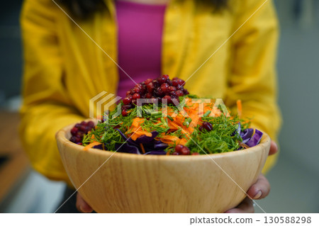 Young woman is broadcasting live from workshop how to prepare a vegetarian food 130588298