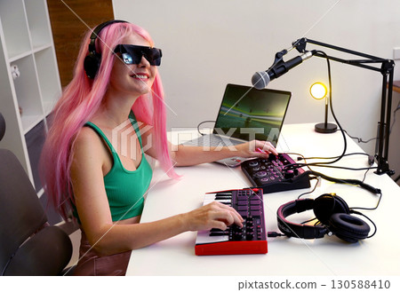 Beautiful young singer and musician broadcast from her home studio 130588410