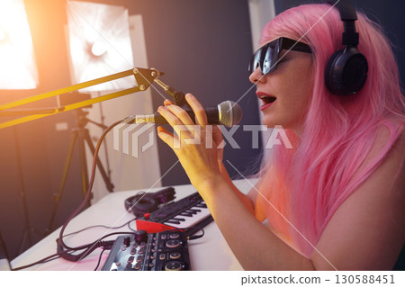 Beautiful young singer and musician broadcast from her home studio 130588451
