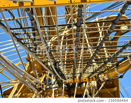 Ropes stretched across the masts of an old ship 130588484