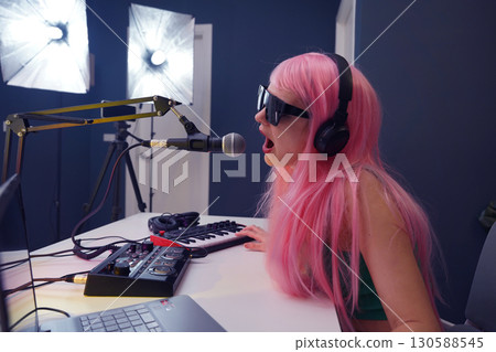Beautiful young singer and musician broadcast from her home studio 130588545