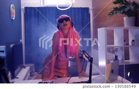 Beautiful young singer and musician broadcast from her home studio 130588549