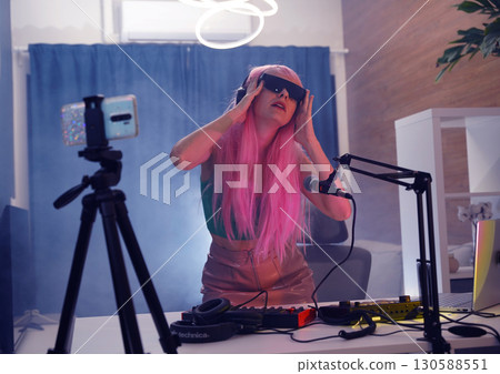 Beautiful young singer and musician broadcast from her home studio 130588551