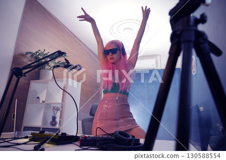 Beautiful young singer and musician broadcast from her home studio Beautiful young singer and musician broadcast from her home studio 130588554