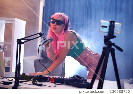 Beautiful young singer and musician broadcast from her home studio 130588790