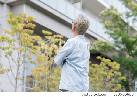 Senior man looking into the distance 130590696