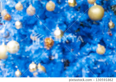 Blurred background golden glitter shiny sparkling banner. Happy Holidays background for template on christmas card brochures posters. Gold bokeh template for digital presentation slideshow background 130591862