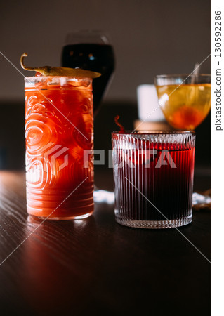 Cocktail set. Alcoholic drink. Bright beverages served in glass on pub table. Bar refreshing assortment with bloody mary wine negroni. Cocktail set. Alcoholic drink. Bright beverages served in glass on pub table. Bar refreshing assortment with bloody mary wine negroni. 130592286