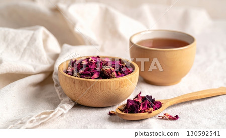 Dried Roses in Wooden Cup with Rose Tea 130592541