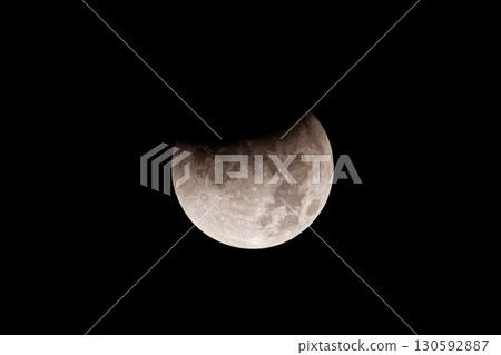 A partial lunar eclipse on its way to becoming a total lunar eclipse 130592887