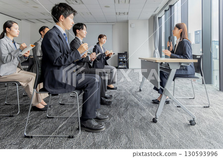 Woman speaking at a conference Woman speaking at a conference 130593996