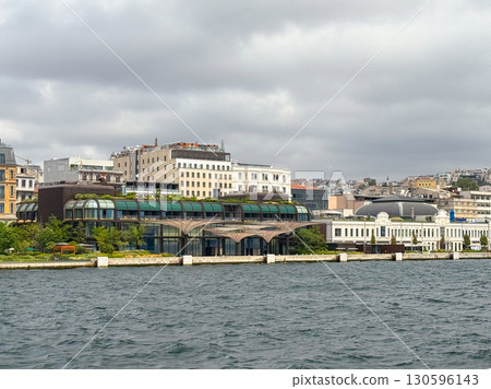 Modern glass buildings and urban development near Bosphorus. Contemporary architecture, business, and lifestyle in Istanbul. Modern glass buildings and urban development near Bosphorus. Contemporary architecture, business, and lifestyle in Istanbul. 130596143