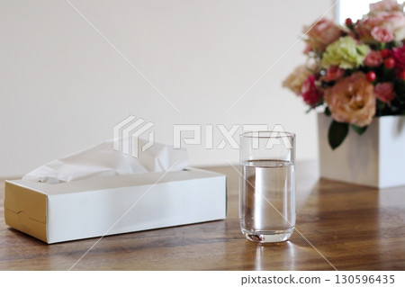 Tissue paper and a cup of water flower arrangement Tissue paper and a cup of water flower arrangement 130596435