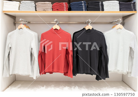 Lots of clothes on display 130597750