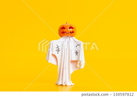 Halloween Ghost with Jack O Lantern Head Isolated on Yellow 130597812