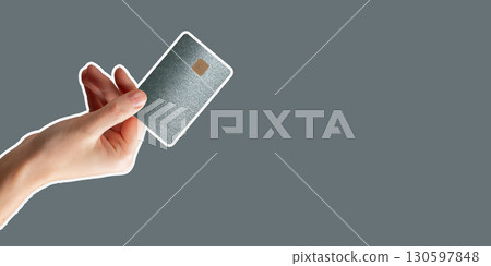 Bankcard held firmly highlights secure commerce, income transfers, and smart financial management. Bankcard held firmly highlights secure commerce, income transfers, and smart financial management. 130597848