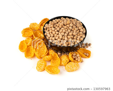 Hummus chickpea chips, chick pea crisps pile, healthy orange snack, fried legume crunchies Hummus chickpea chips, chick pea crisps pile, healthy orange snack, fried legume crunchies 130597963