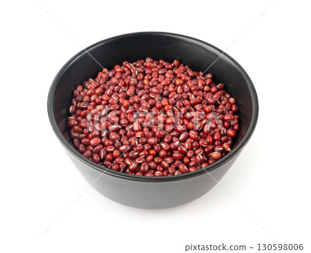 Red adzuki beans isolated, raw azuki bean pile, Vigna angularis legume seeds, dry red mung bean 130598006