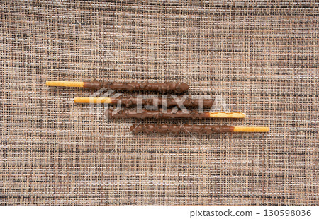 Chocolate cookie sticks, long choco pastries, japan biscuit tubes, korea cracker sticks 130598036