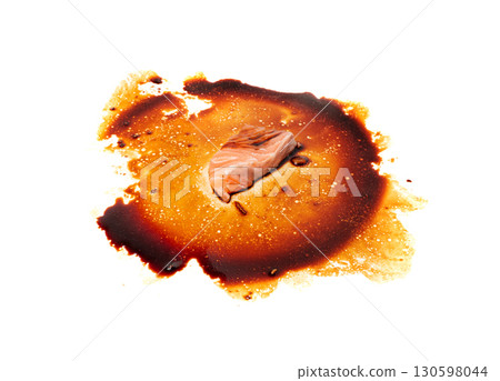 Spilled Soy Sause Leftovers with a Piece of Fish Isolated, Teriyaki Drops on White Plate, Oyster Sauce 130598044