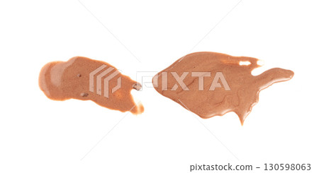 Melted chocolate ice cream isolated, real melting cocoa icecream drops, chocolate ice stain Melted chocolate ice cream isolated, real melting cocoa icecream drops, chocolate ice stain 130598063
