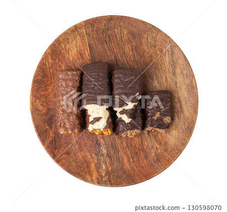 Protein bar isolated, chocolate energy paleo snack, healthy cereal nutrition with nuts, fruits, muesli 130598070