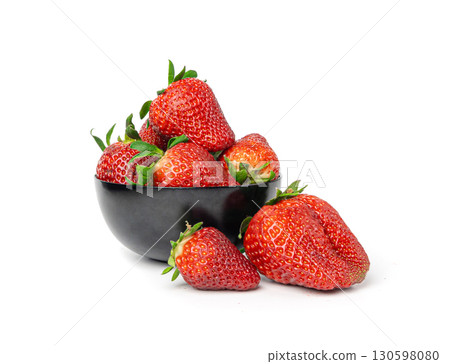 Fresh strawberry isolated, whole ripe straw berry, red juicy imperfect strawberri with green leaves 130598080