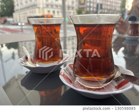 Turkish Tea on a Street Cafe Table, Traditional Arabic Cup in Restaurant, Black Tea Drinking 130598085