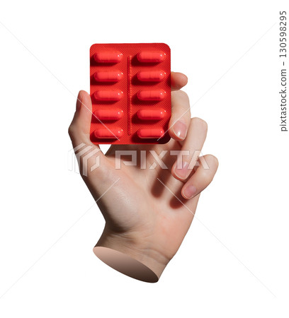 Hand holding blister pack with red capsules. Concept of medication, prescription drugs, healthcare, 130598295