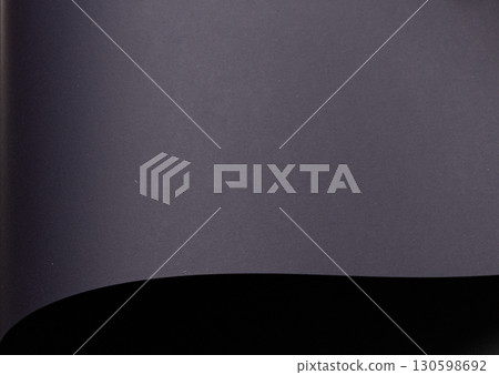 A minimalistic backdrop with navy blue designer paper texture. Elegant, contemporary material with a A minimalistic backdrop with navy blue designer paper texture. Elegant, contemporary material with a 130598692