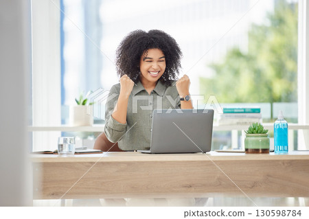 Success, winning and black woman with laptop in office reading email with news of bonus, promotion or deal announcement. Happy, sales target prize and winner employee celebrating on office with smile 130598784