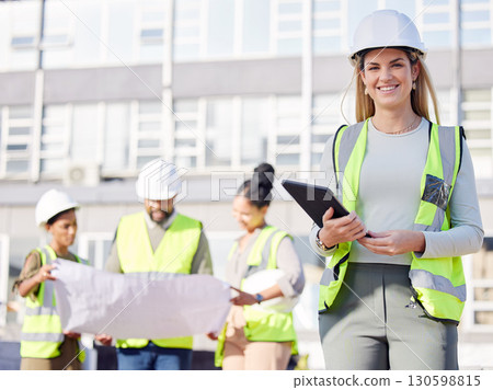 Architect, leader and woman construction worker with tablet, smile in portrait with digital blueprint. Architecture, contractor and happy female engineer, building industry and team with floor plan Architect, leader and woman construction worker with tablet, smile in portrait with digital blueprint. Architecture, contractor and happy female engineer, building industry and team with floor plan 130598815
