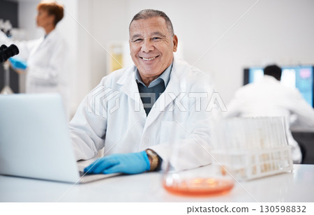 Happy, research and portrait of a scientist with a laptop for healthcare, virus results and email. Lab, science and mature man typing on a computer for medical innnovation, analysis and report 130598832