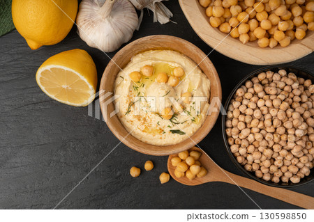 Hummus in bowl, houmous dip, chickpea humus tahini sauce, middle eastern spread 130598850