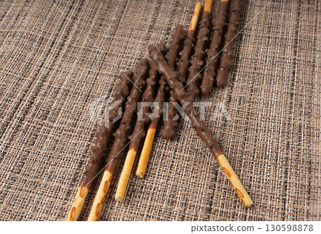 Chocolate cookie sticks, long choco pastries, japan biscuit tubes, korea cracker sticks Chocolate cookie sticks, long choco pastries, japan biscuit tubes, korea cracker sticks 130598878