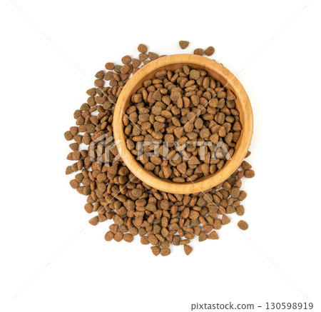 Dry pet food, dog kibble pile, puppy pellets, small canine protein croquette meal, animal food Dry pet food, dog kibble pile, puppy pellets, small canine protein croquette meal, animal food 130598919