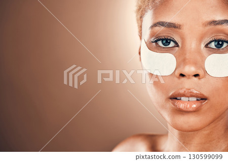 Black woman, eyes and portrait for beauty patch on a mockup background for collagen dermatology. Aesthetic model person in studio for skincare, self care and facial skin glow with gel mask space 130599099