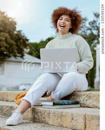 Laptop, college and portrait of a woman student in the city sitting on the stairs studying for test or exam. Education, university and young female from Brazil working on academic project on computer 130599104