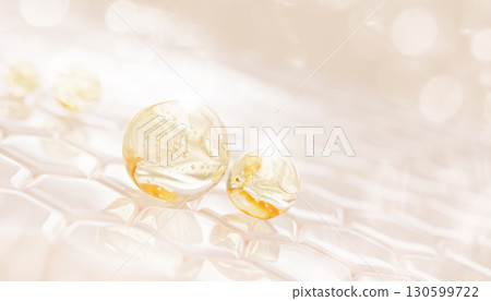 Facial skin cells with gold liquid gel serum, oil drops texture. Epidermis layer with hexagon pattern, yellow honey or retinol mask, collagen vitamin essence bubbles. Cosmetic care bg. 3D illustration 130599722